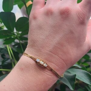 Elegant Gold Bracelet with Opal Accents